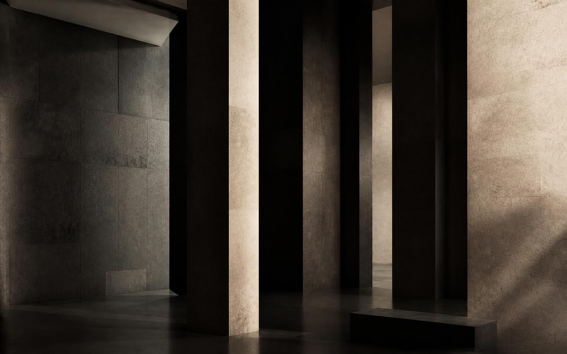 Interior arquitectónico de piedra con luz tenue, referencia visual de solidez y permanencia